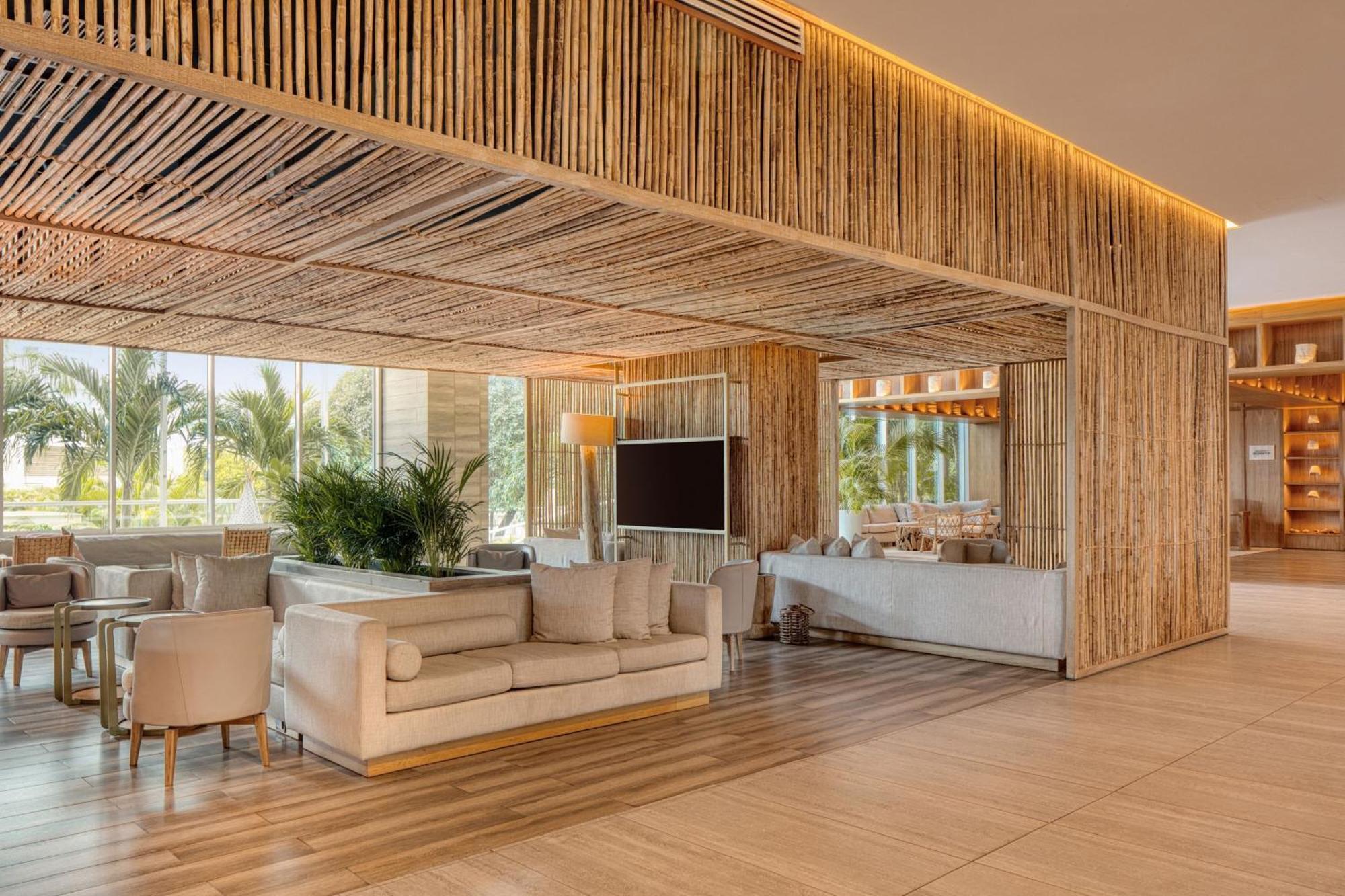 منتجع سانتا مارتا ماريوت بلايا دورميدا المظهر الخارجي الصورة The lobby of the hotel