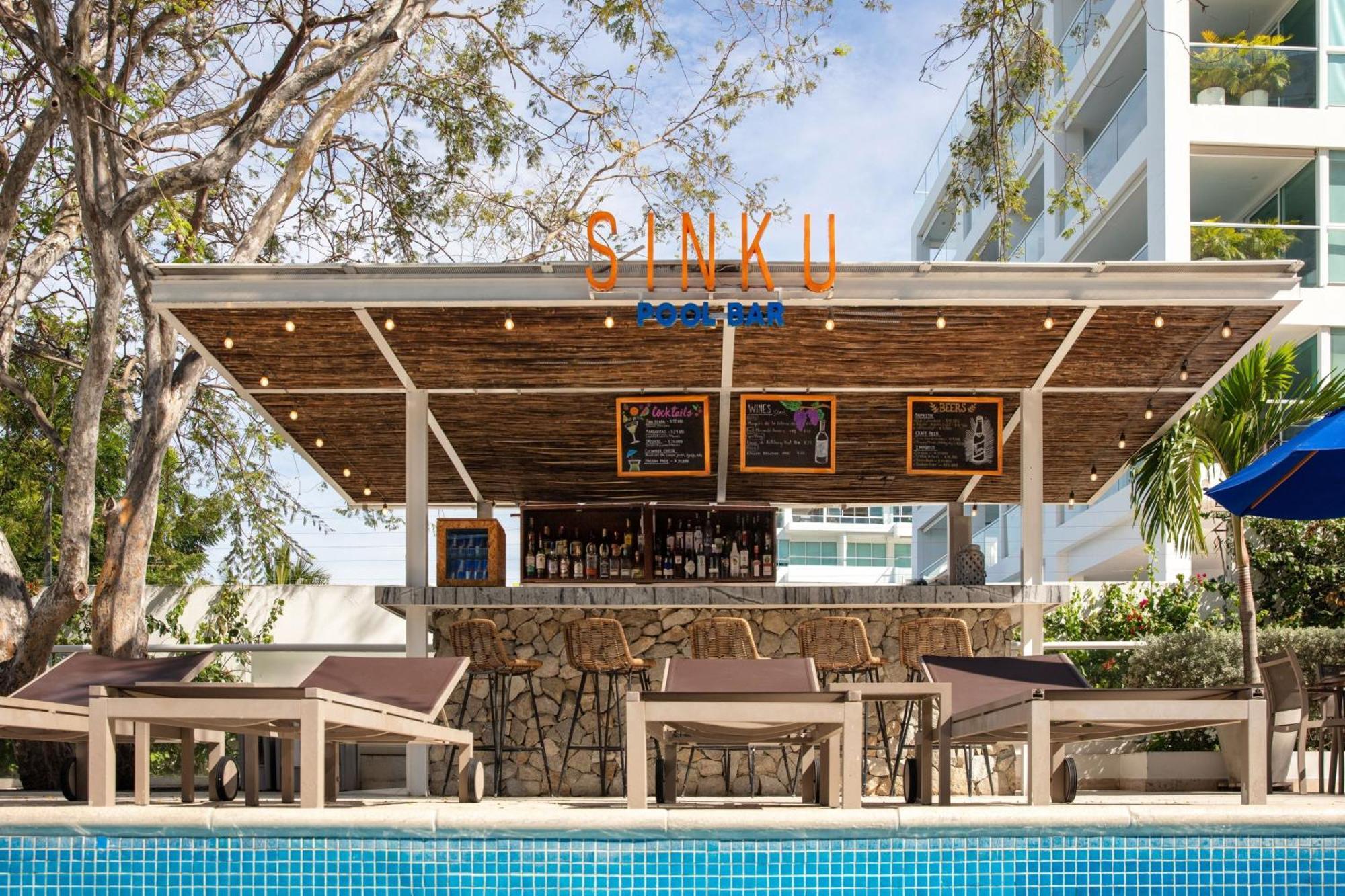 منتجع سانتا مارتا ماريوت بلايا دورميدا المظهر الخارجي الصورة The pool bar at the hotel
