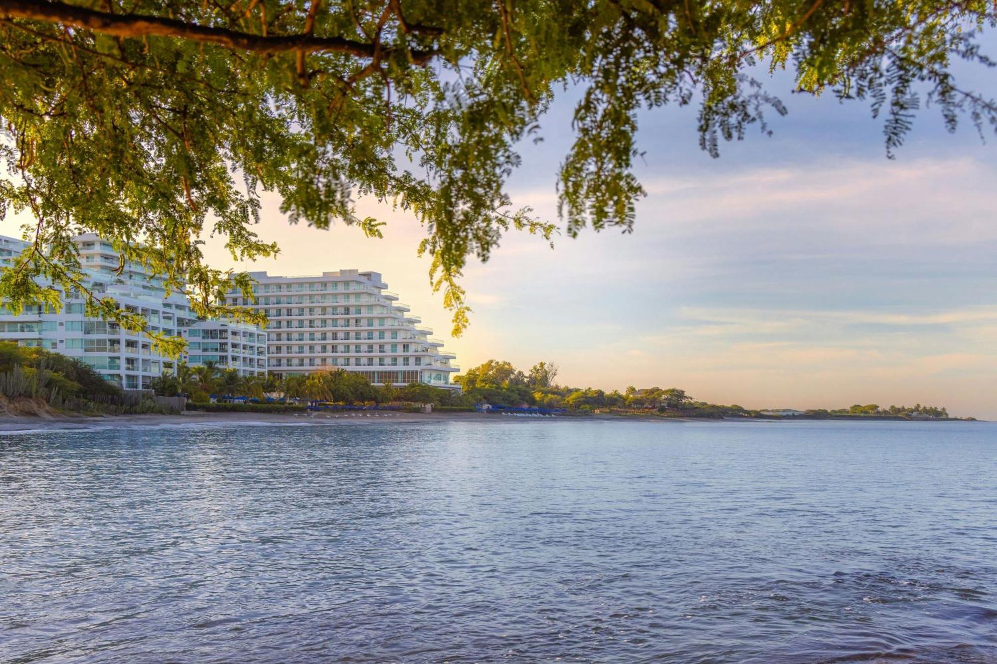 منتجع سانتا مارتا ماريوت بلايا دورميدا المظهر الخارجي الصورة The hotel from the lake